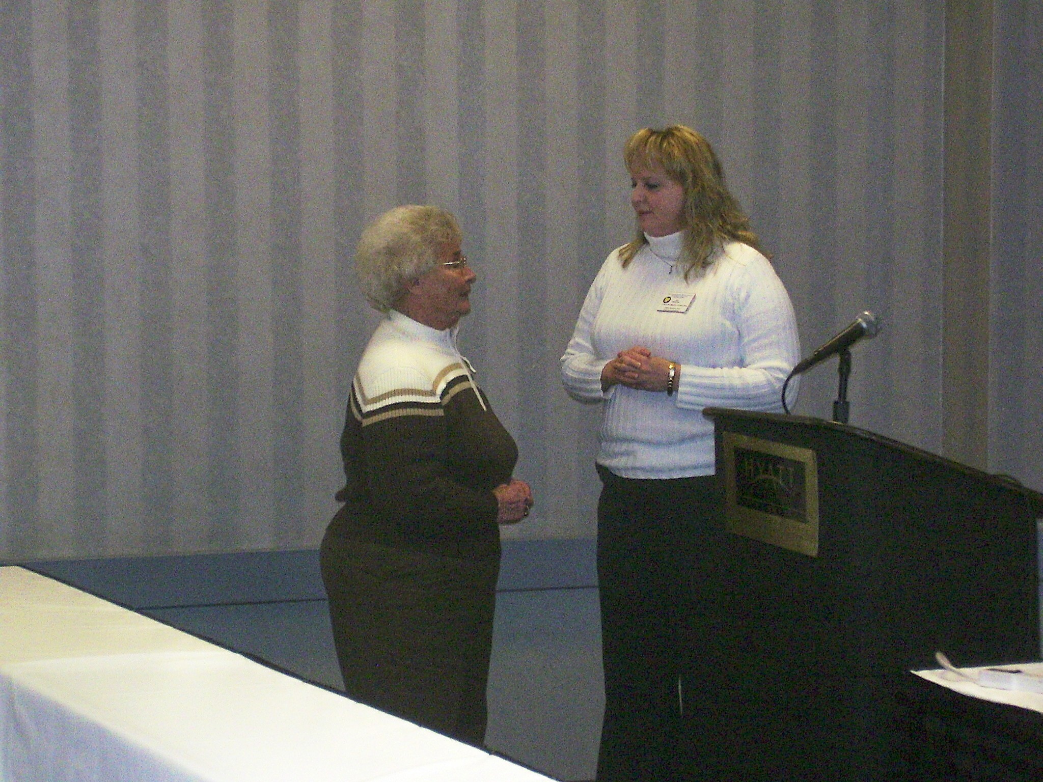 JoAnn recieves her past president pin from
                        B Huffman